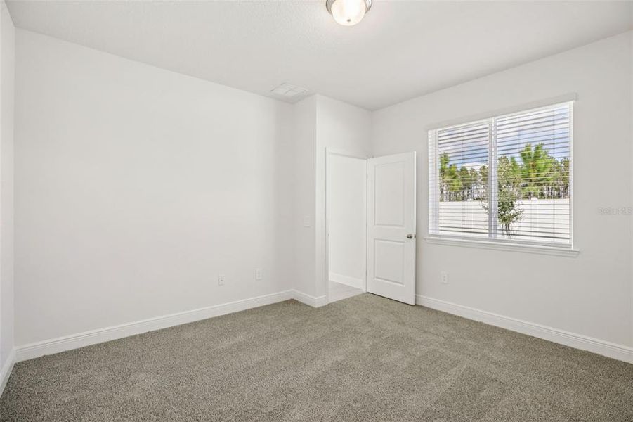 Spacious, unfurnished interior of a new home in Cyrene at Minneola - Villas, Minneola (Image 28).