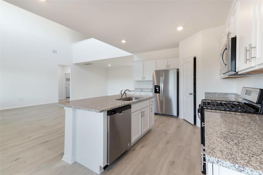 Furnished interior view inside a new home in Bar W Ranch, Leander (Image 7). Furnished interior view inside a new home in Bar W Ranch, Leander (Image 7).