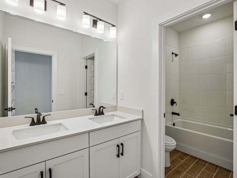 Furnished interior view inside a new home in Magnolia Bay - Reserve Series, Nokomis (Image 12).