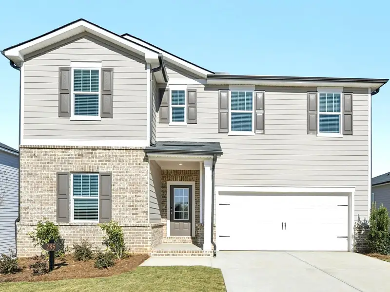 Front exterior of a new home in Preserve at Mountain Creek, Pendergrass, GA, highlighting curb appeal (Image 1).
