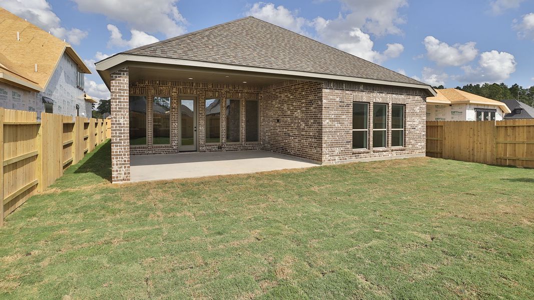 Exterior details and patio area of a home in Evergreen, Conroe (Image 4).