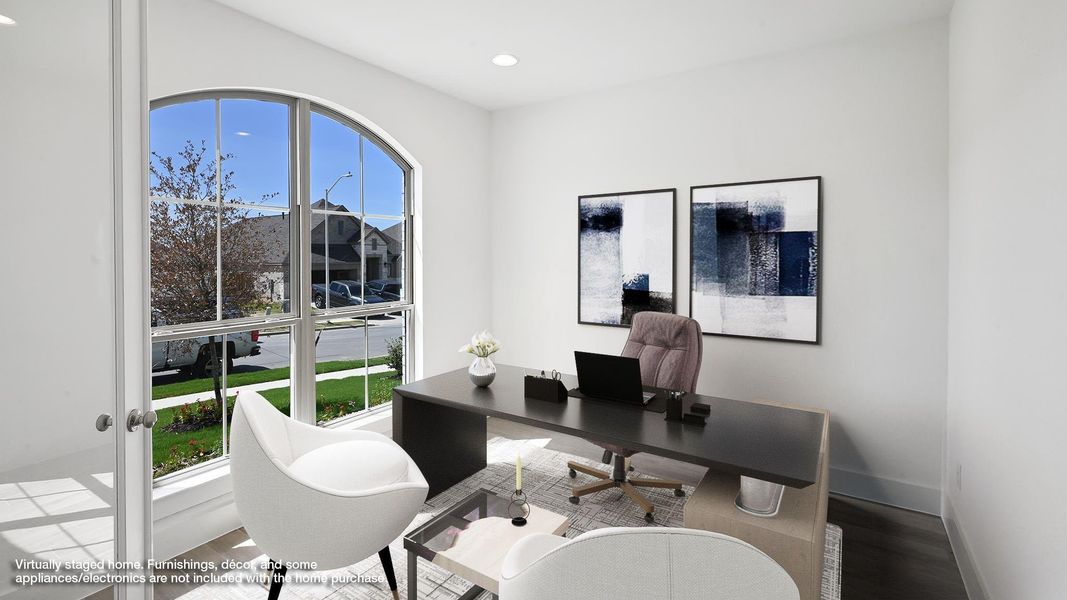 Home office with wood finished floors and recessed lighting
