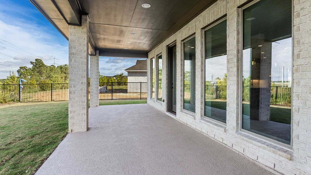 Exterior details and patio area of a home in Bridgeland, Cypress (Image 3).