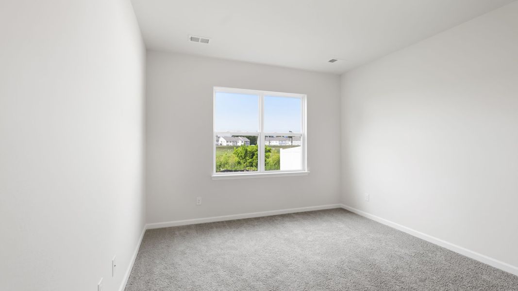 Spacious, unfurnished interior of a new home in Tap Root Farms, Fletcher (Image 25).