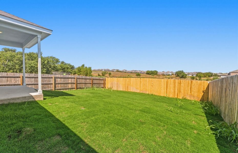 Exterior details and patio area of a home in Sonterra, Jarrell (Image 29).