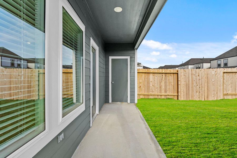 Exterior details and patio area of a home in Grand West, Houston (Image 3).