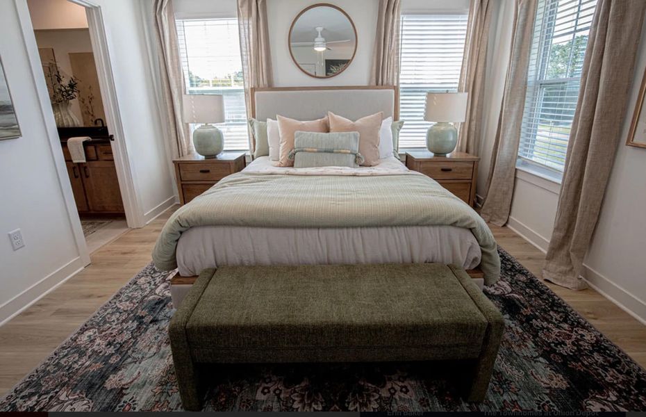 Bedroom with baseboards and light wood-style flooring