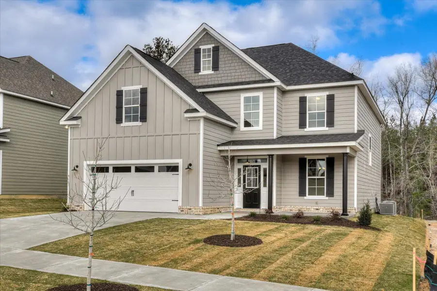 Front exterior of a new home in Tillery Park, Grovetown, GA, highlighting curb appeal (Image 2). Front exterior of a new home in Tillery Park, Grovetown, GA, highlighting curb appeal (Image 2).