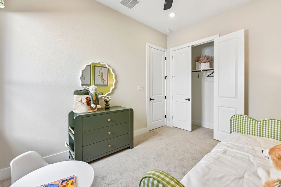 Representative furnished interior of a home built from the Enfield by Taylor Morrison in Village Grove, Dripping Springs (Image 32).