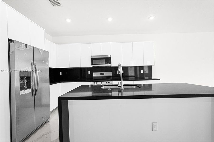 Furnished interior view inside a new home in , Miami (Image 12).