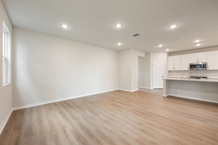Spacious, unfurnished interior of a new home in The Cottages at Lariat, Liberty Hill (Image 34).