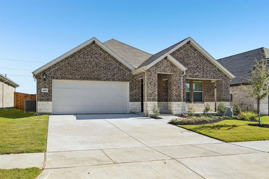 Front exterior of a new home in Westmoor, Sherman, TX, highlighting curb appeal (Image 1).