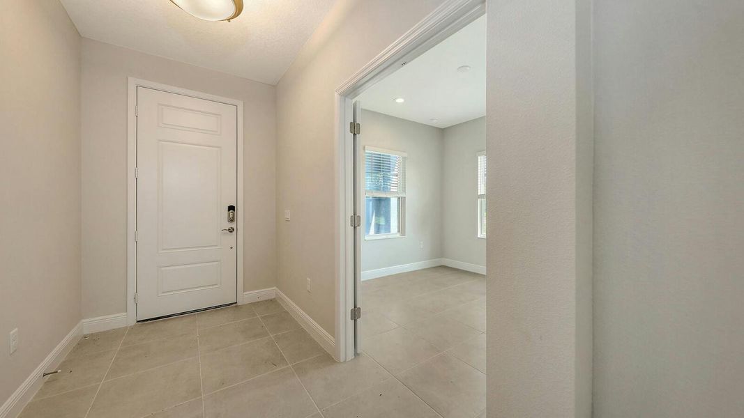 Spacious, unfurnished interior of a new home in Wildleaf Real Estate and Homes for Sale in Parrish, FL - Neal Communities, Parrish (Image 21). Spacious, unfurnished interior of a new home in Wildleaf Real Estate and Homes for Sale in Parrish, FL - Neal Communities, Parrish (Image 21).