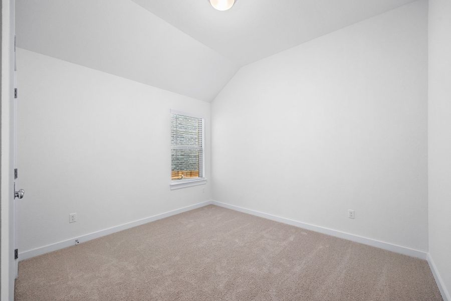 Bedroom in the Cypress home plan by Trophy Signature Homes - REPRESENTATIVE PHOTO Bedroom in the Cypress home plan by Trophy Signature Homes - REPRESENTATIVE PHOTO