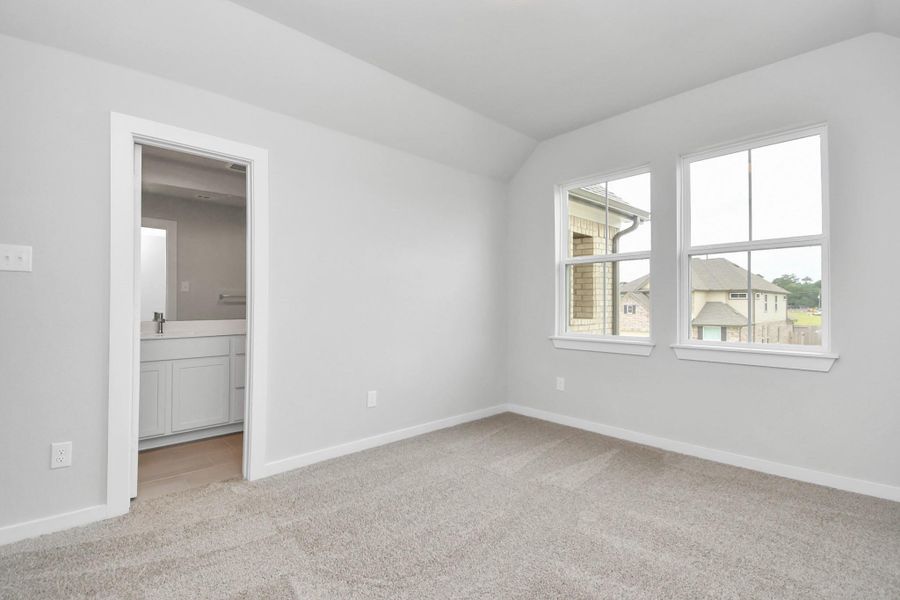 Inviting guest suite adorned with modern charm. The room features elegant 5-panel doors with sleek, contemporary hardware that adds a touch of sophistication. Sink your feet into the plush, fluffy carpet that invites comfort and warmth. Large windows flood the space with an abundance of natural light, framed by privacy blinds that offer the perfect balance between openness and seclusion. Sample photo, actual color and selections can vary. Inviting guest suite adorned with modern charm. The room features elegant 5-panel doors with sleek, contemporary hardware that adds a touch of sophistication. Sink your feet into the plush, fluffy carpet that invites comfort and warmth. Large windows flood the space with an abundance of natural light, framed by privacy blinds that offer the perfect balance between openness and seclusion. Sample photo, actual color and selections can vary.