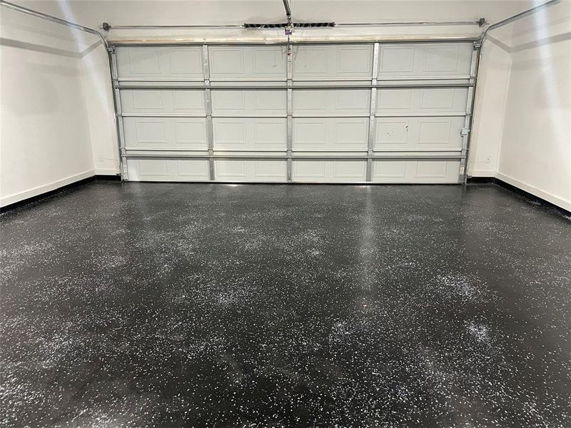 View of garage with epoxy floors