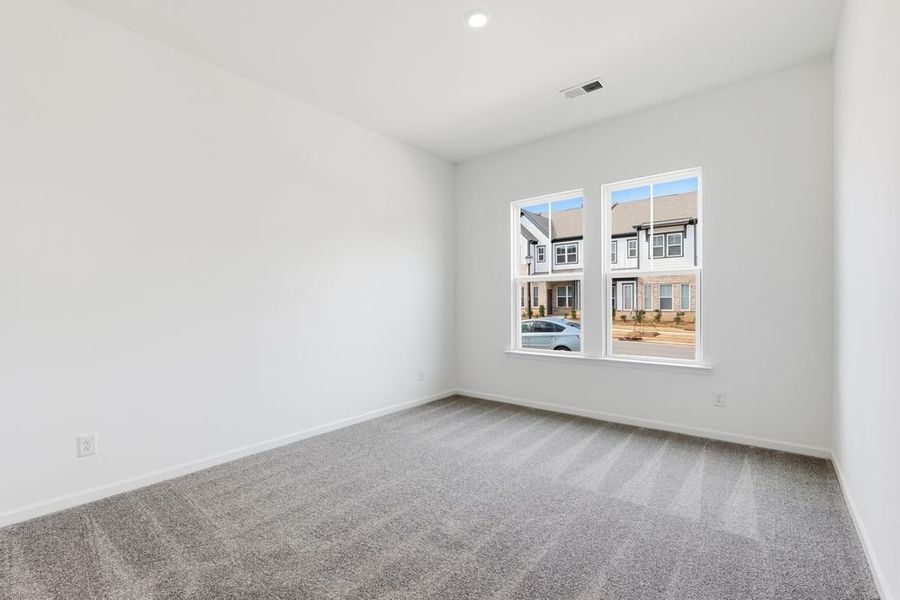 Spacious, unfurnished interior of a new home in Ridge at Sugar Creek, Indian Land (Image 12).