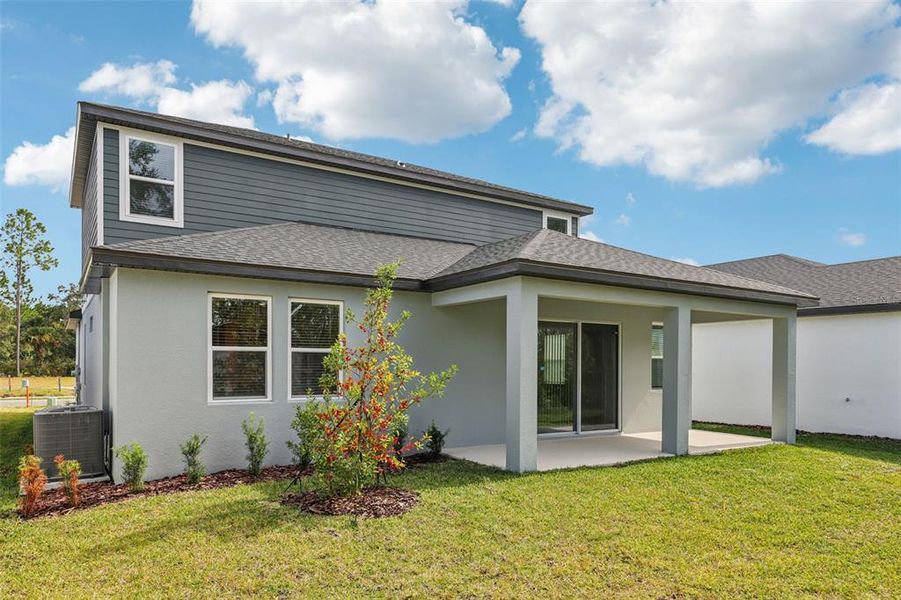 Exterior details and patio area of a home in Ridgehaven - Signature Series, Ormond Beach (Image 29).