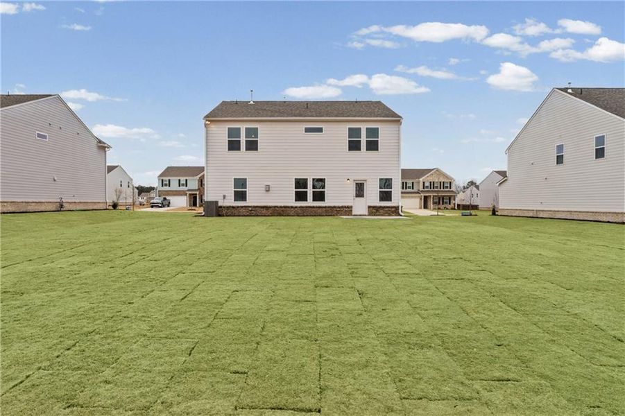 Exterior details and patio area of a home in Anderson Point, McDonough (Image 2).