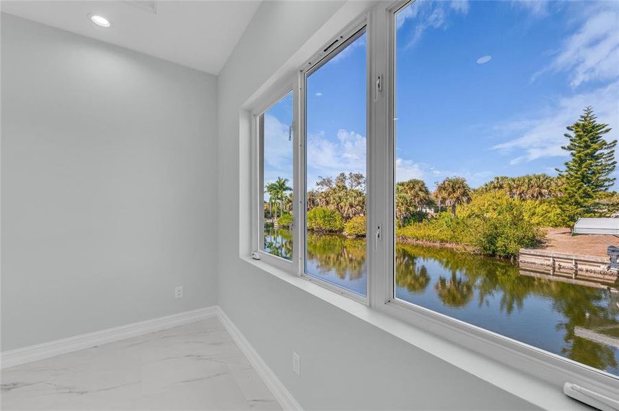 Spacious, unfurnished interior of a new home in , Port Charlotte (Image 20).