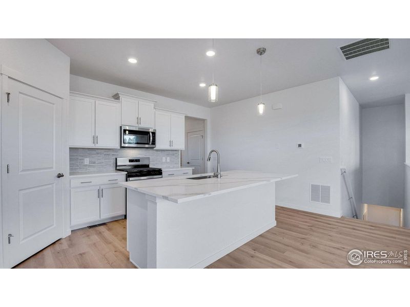 Furnished interior view inside a new home in Vantage, Berthoud (Image 8). Furnished interior view inside a new home in Vantage, Berthoud (Image 8).