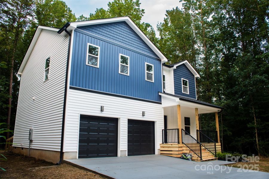 Front exterior of a new home in , Charlotte, NC, highlighting curb appeal (Image 22). Front exterior of a new home in , Charlotte, NC, highlighting curb appeal (Image 22).