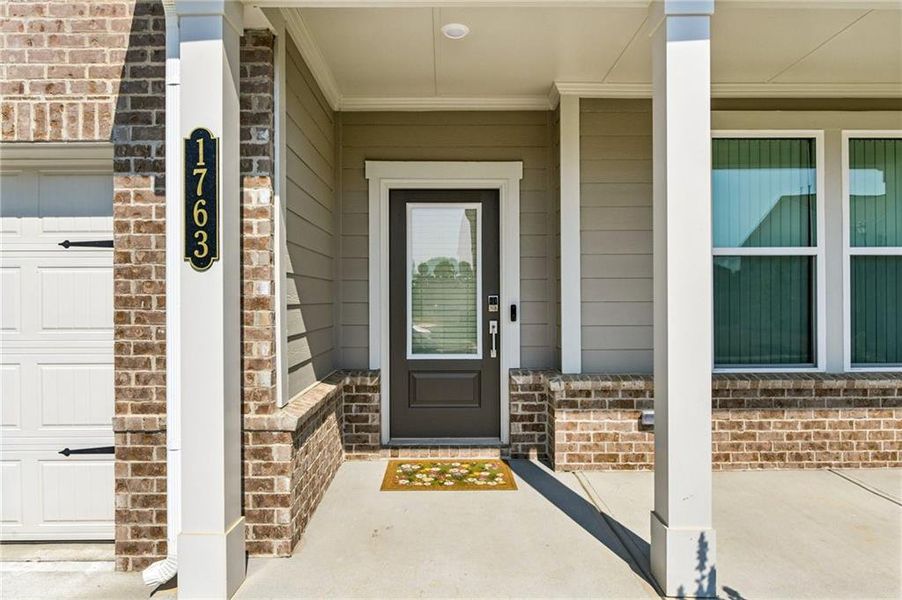 Exterior details and patio area of a home in Windance Lake, Loganville (Image 21).