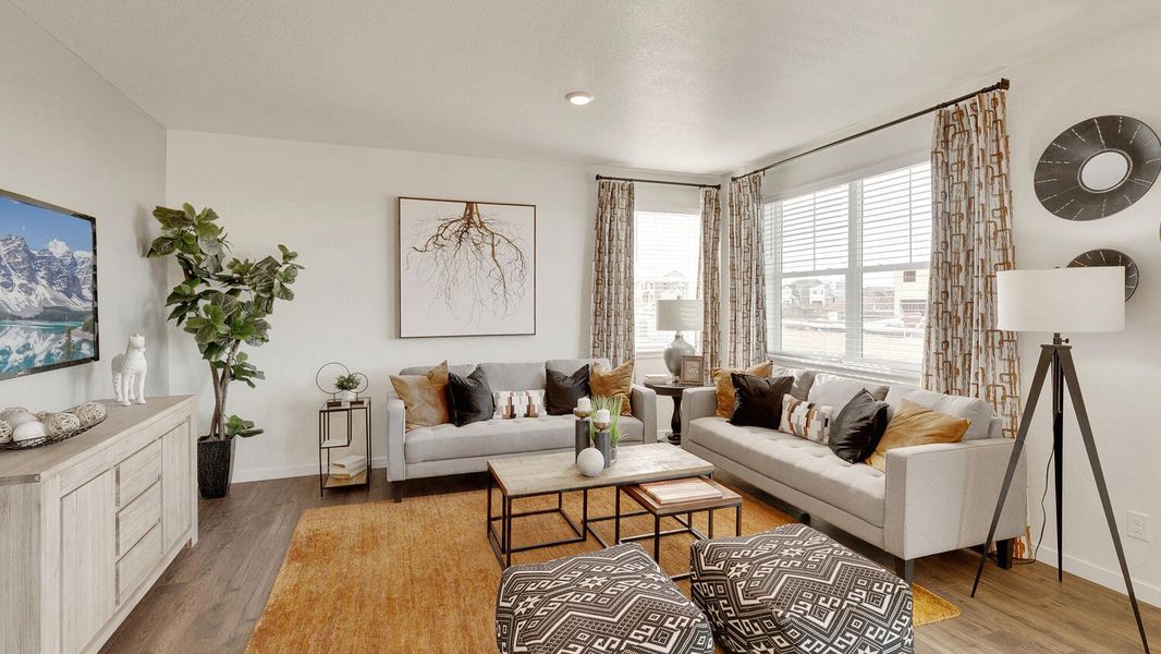 Representative furnished interior of a home built from the Holcombe by D.R. Horton in Settlers Crossing, Commerce City (Image 7).