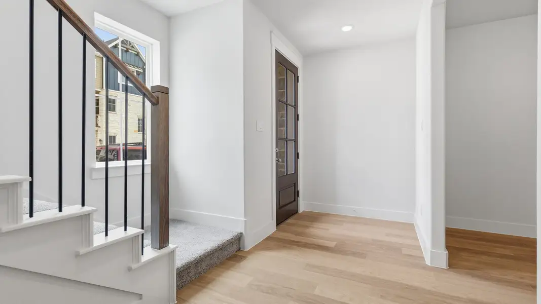 Furnished interior view inside a new home in Collin Creek, Plano (Image 9).