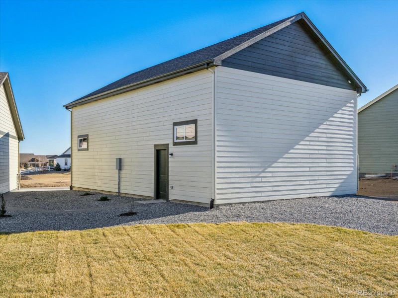 Exterior details and patio area of a home in , Dacono (Image 24).