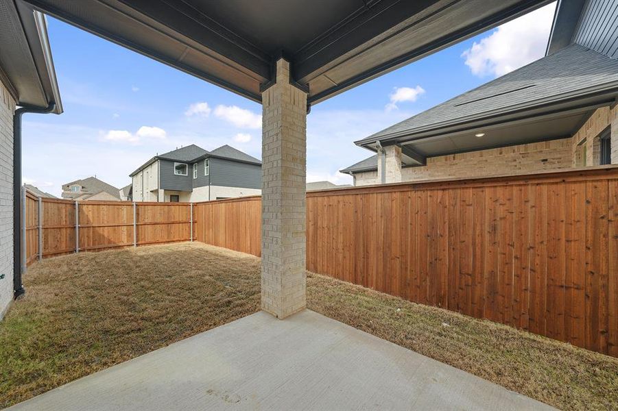 Exterior details and patio area of a home in Cottages of Celina, Celina (Image 3).