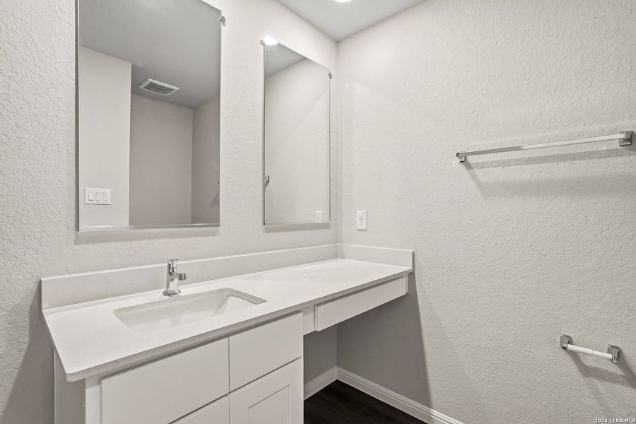 Furnished interior view inside a new home in Cinco Lakes, San Antonio (Image 11).