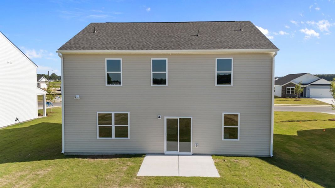 Exterior details and patio area of a home in East Ridge, Ayden (Image 17).