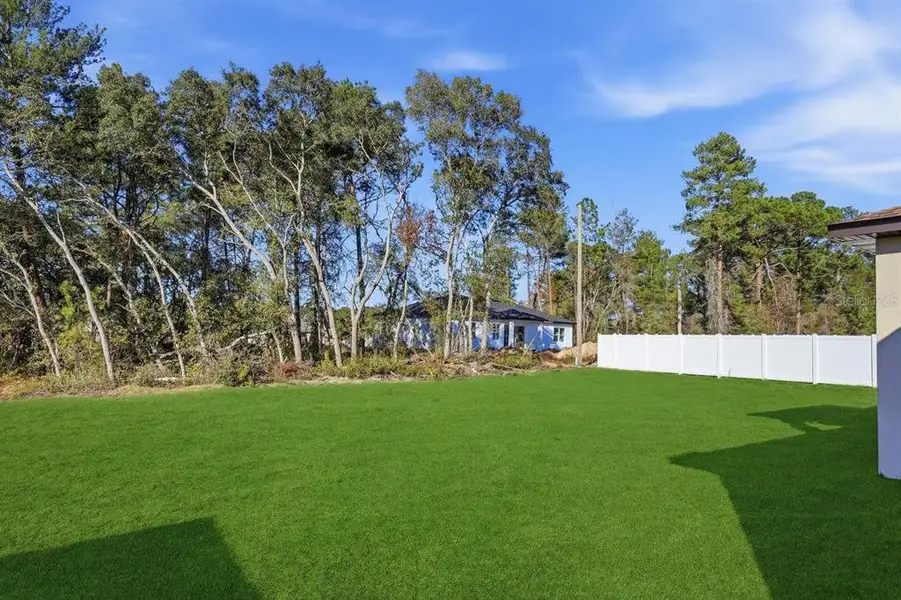 Exterior details and patio area of a home in , Ocala (Image 4).