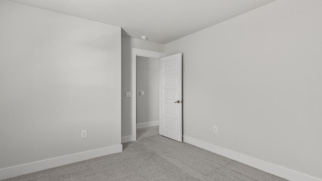 Spacious, unfurnished interior of a new home in Sidbury Station, Castle Hayne (Image 30).