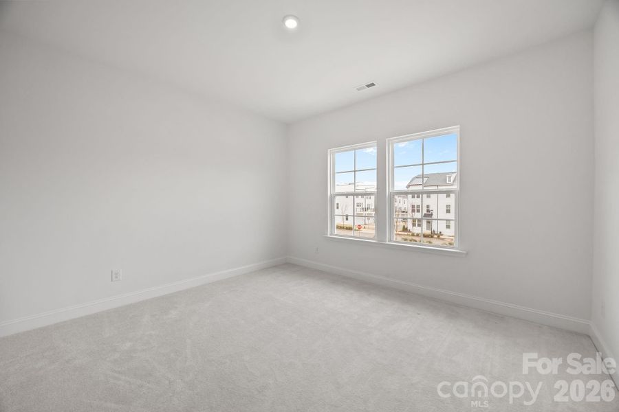 Spacious, unfurnished interior of a new home in The River District Townhomes, Charlotte (Image 17).