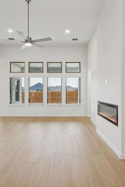 Living Room in the Gilmour II home plan by Trophy Signature Homes – REPRESENTATIVE PHOTO