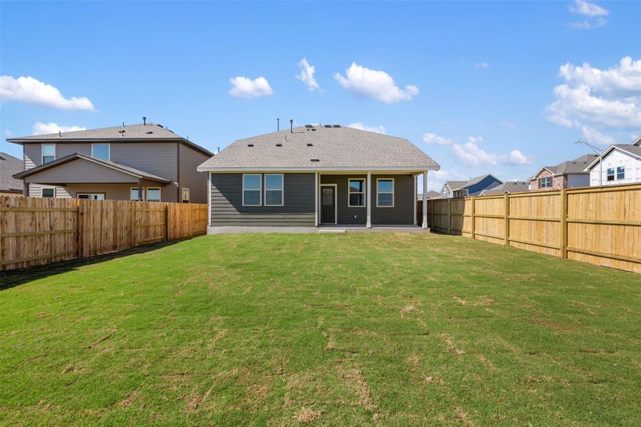 Exterior details and patio area of a home in Patterson Ranch, Georgetown (Image 27).