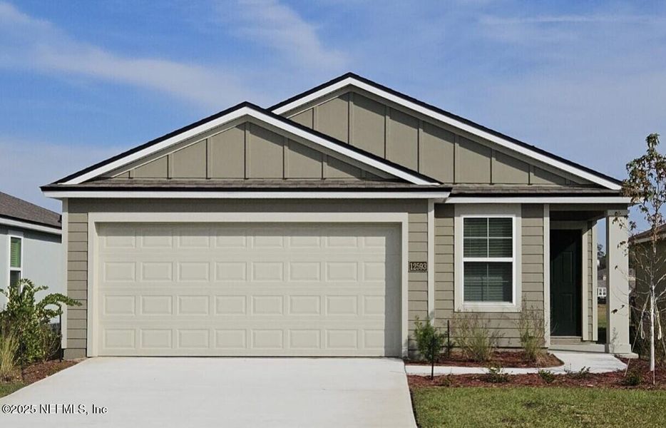 Front exterior of a new home in The Arbors, Jacksonville, FL, highlighting curb appeal (Image 1). Front exterior of a new home in The Arbors, Jacksonville, FL, highlighting curb appeal (Image 1).