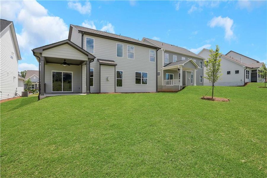 Exterior details and patio area of a home in Twin Lakes, Hoschton (Image 19).