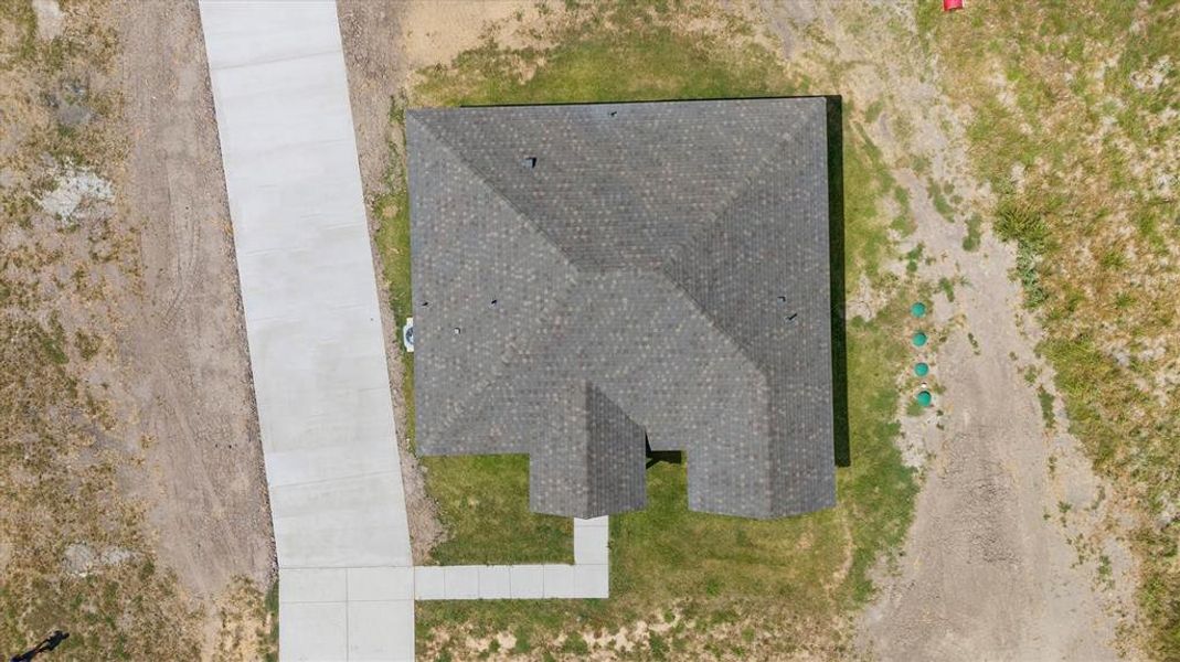 Front exterior of a new home in , Commerce, TX, highlighting curb appeal (Image 17). Front exterior of a new home in , Commerce, TX, highlighting curb appeal (Image 17).