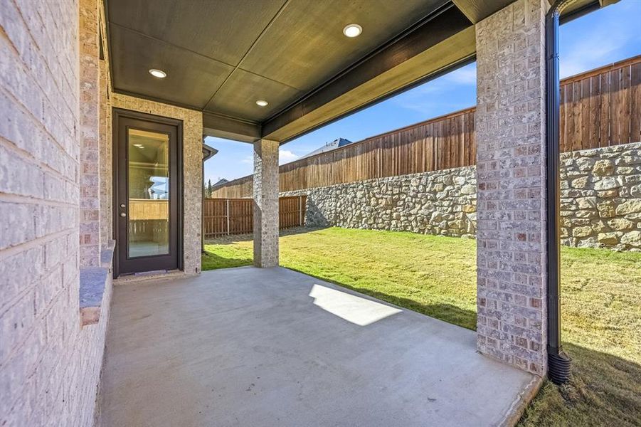 Exterior details and patio area of a home in Gateway Village - The Reserve, Denison (Image 2). Exterior details and patio area of a home in Gateway Village - The Reserve, Denison (Image 2).