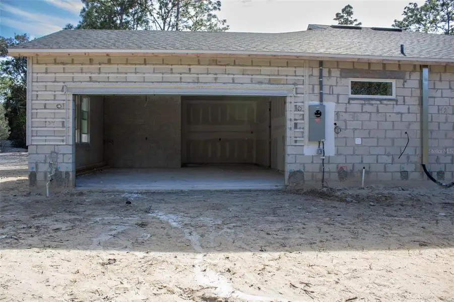 In-progress construction of a new home in Pine Ridge Estates, Beverly Hills, FL (Image 6).