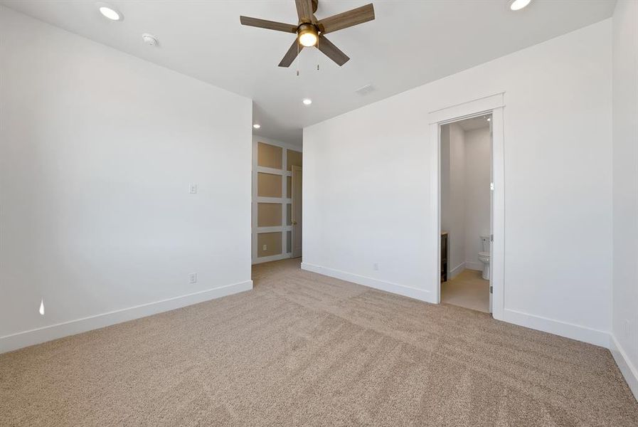 Unfurnished room featuring light carpet, recessed lighting, and ceiling fan