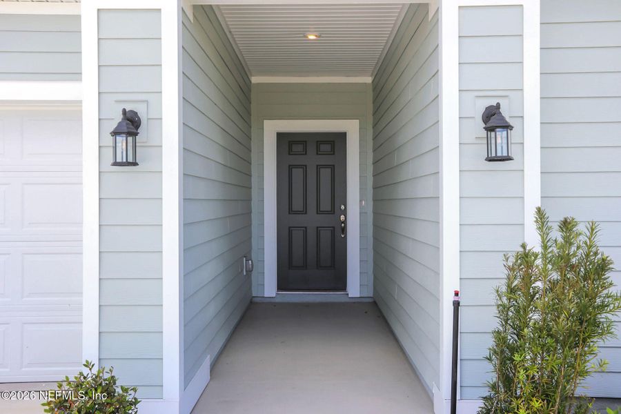 Exterior details and patio area of a home in Amberly, Green Cove Springs (Image 28).