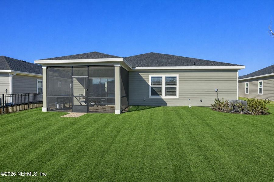Exterior details and patio area of a home in St Augustine Lakes, St. Augustine (Image 3).