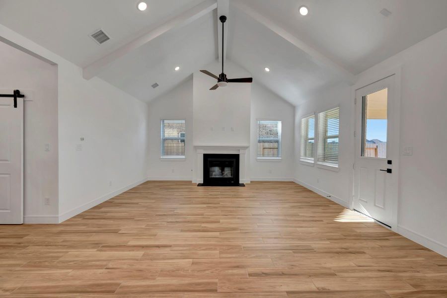 Open great room with cozy fireplace Open great room with cozy fireplace