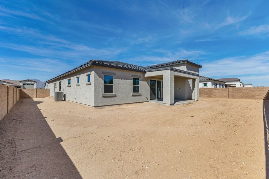 Exterior details and patio area of a home in Valencia at Granite Vista, Waddell (Image 19).