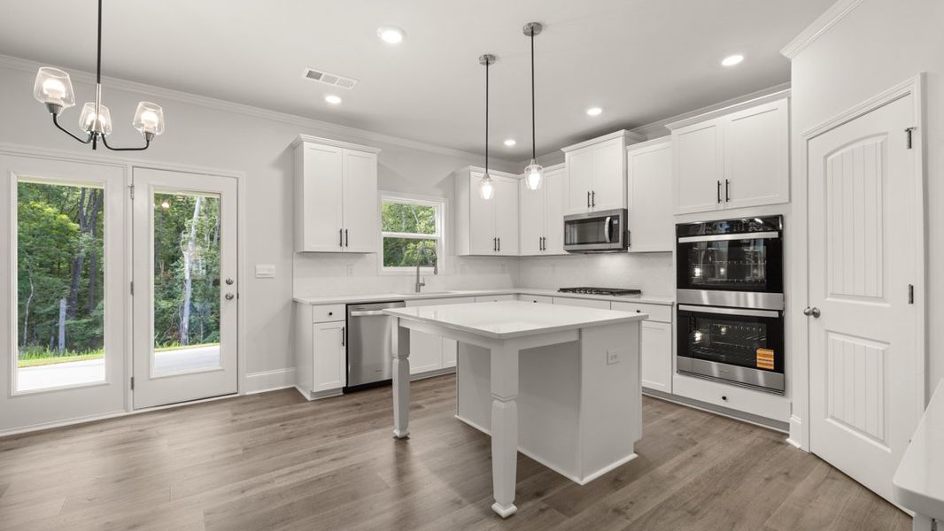 Representative furnished interior of a home built from the Grayson by D.R. Horton in Holland Estates, Powder Springs (Image 4).