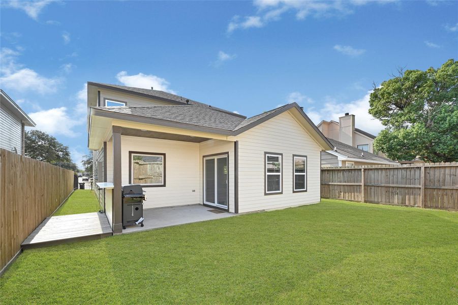 Exterior details and patio area of a home in , Houston (Image 3). Exterior details and patio area of a home in , Houston (Image 3).